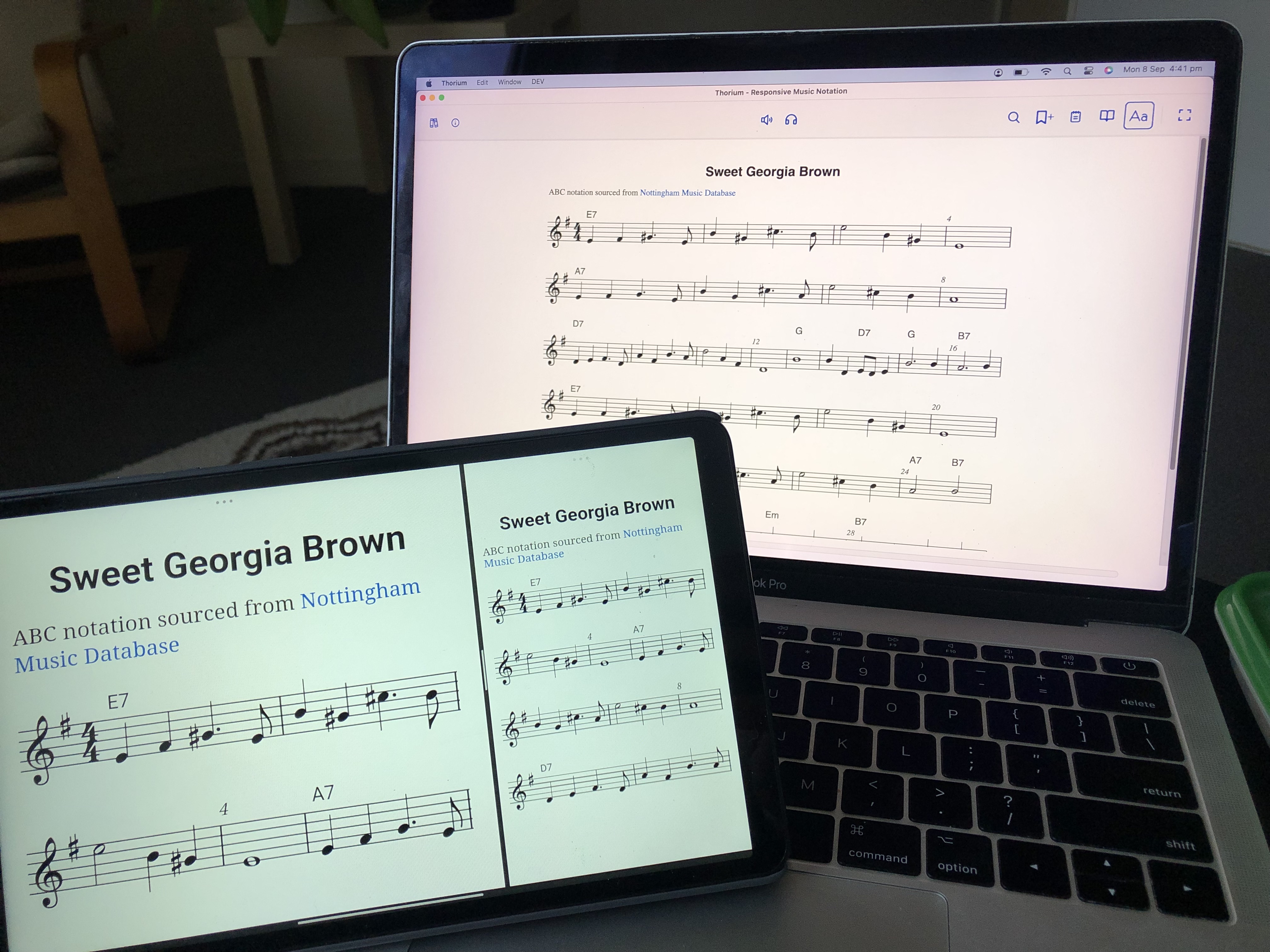 Responsive Music Notation in the world photo of a laptop and a tablet showing the same musical score 'Sweet Georgia Brown' on each